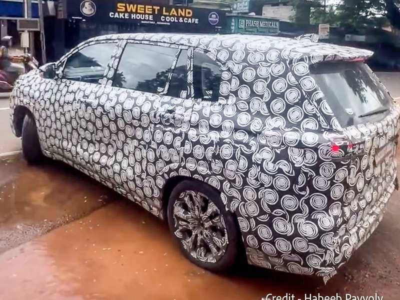 2027 Toyota Innova Hycross facelift test mule spied under heavy camouflage during road testing