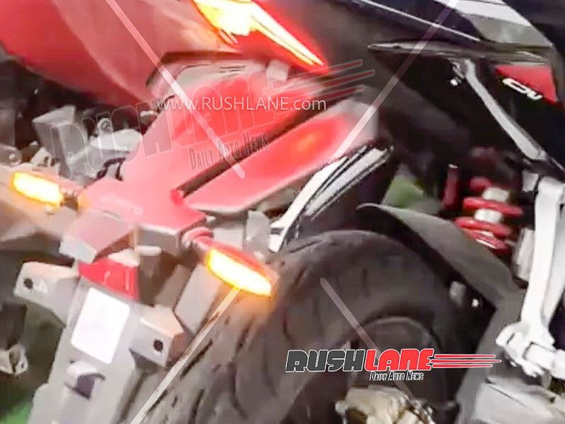 Hero Karizma XMR 250 undisguised spy shot showing aggressive fairing and black paint with red accents