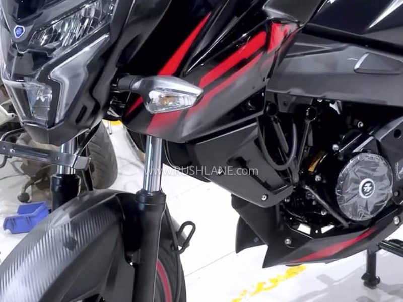 Bajaj Pulsar NS125 spied at dealership with new digital display and fresh colours
