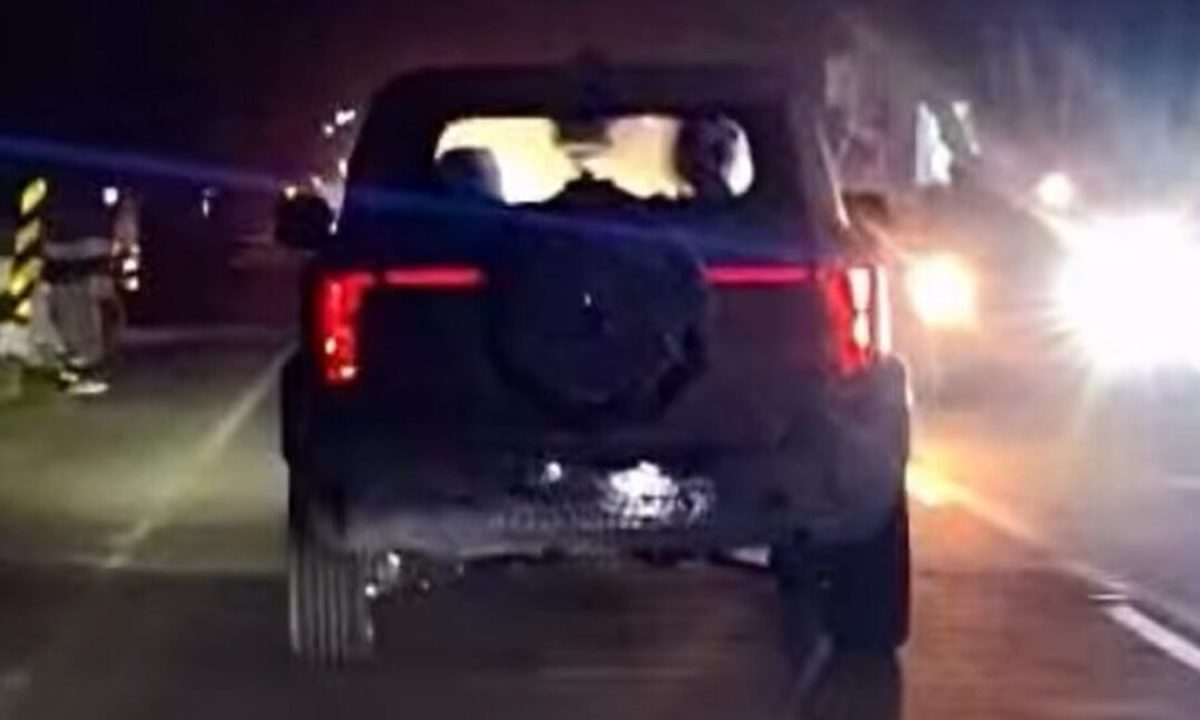 Mahindra Vision S production SUV rear view showing connected LED tail light design during night testing